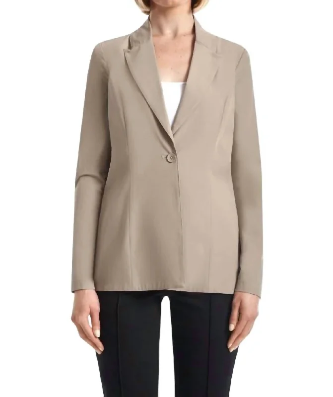 Curated collections of sophisticated women’s wear   Titan Blazer